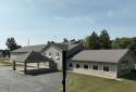 Auction - Quality Inn Redgranite