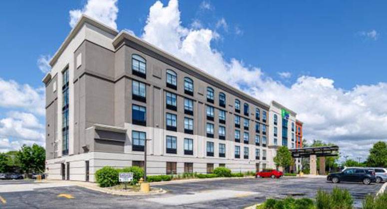Marcus & Millichap Arranges Sale of 108-Room Holiday Inn Express & Suites in Prospect Heights, Illinois